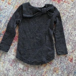 Girls size small(3/4) black/white stripped bow top